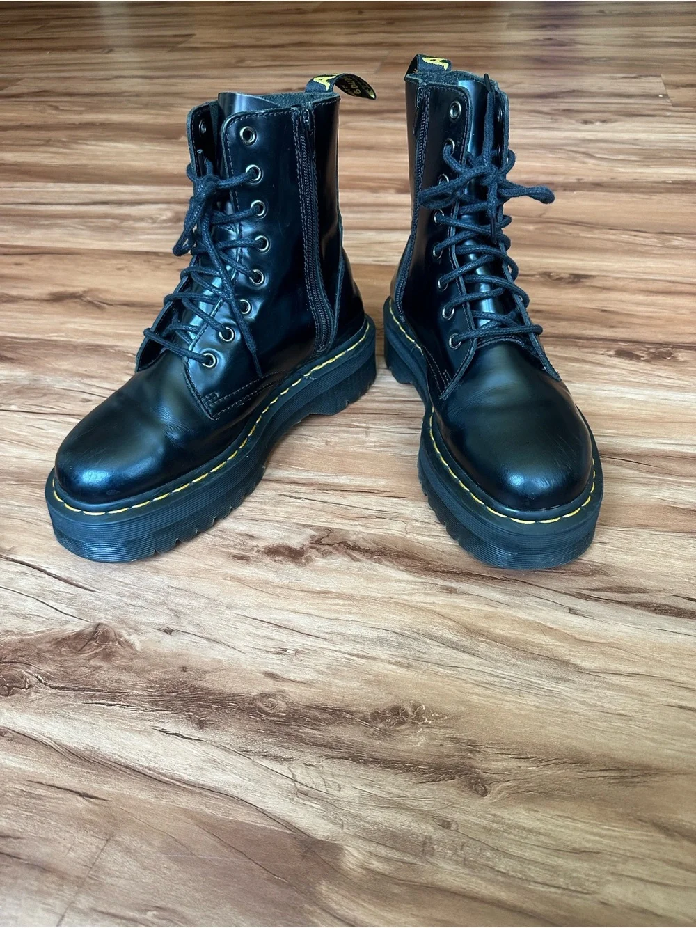 Dr. Martens Black Leather Platform Combat Boots with Yellow Stitching
